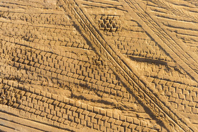 Full frame shot of tire tracks