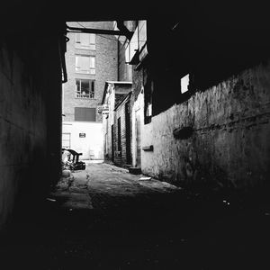 Narrow alley along buildings