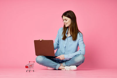 Young woman using mobile phone