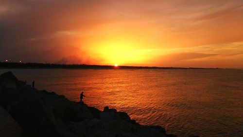 Scenic view of sea during sunset