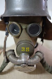 Close-up of gas mask on table