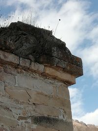 Low angle view of old building against sky