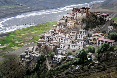 High angle view of townscape by river