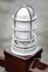 Close-up of electric lamp on table