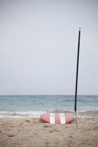 Scenic view of beach against clear sky