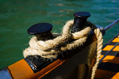 High angle view of rope tied on boat