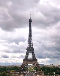 Low angle view of tower against cloudy sky