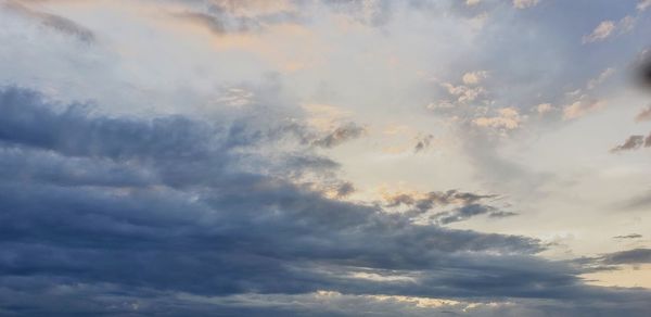 Low angle view of clouds in sky during sunset