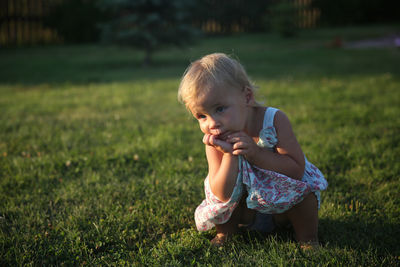 Close-up of girl on grass
