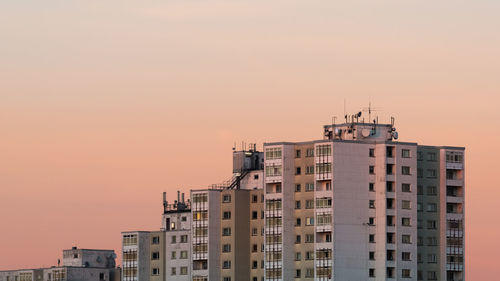 View of buildings against sky during sunset