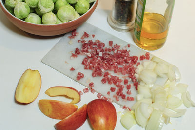 High angle view of fruits on cutting board