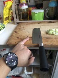 Midsection of woman preparing food at home