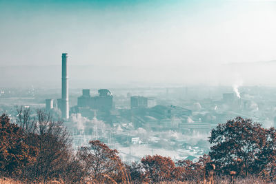 Buildings in city against sky