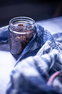 Close-up of ice cream in jar on table