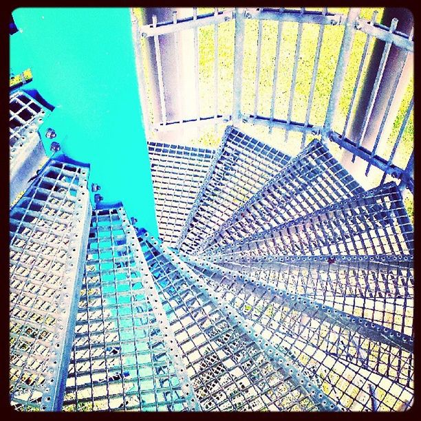 transfer print, auto post production filter, blue, built structure, architecture, sunlight, pattern, shadow, clear sky, building exterior, day, indoors, glass - material, low angle view, railing, modern, steps, geometric shape, tiled floor