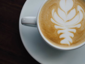 High angle view of cappuccino on table