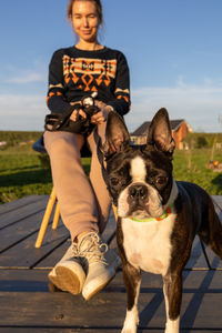 Portrait of woman with dog