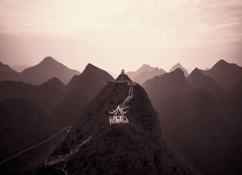 Scenic view of mountains against sky during sunset