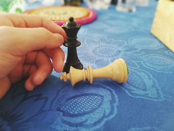 Close-up of man holding hands