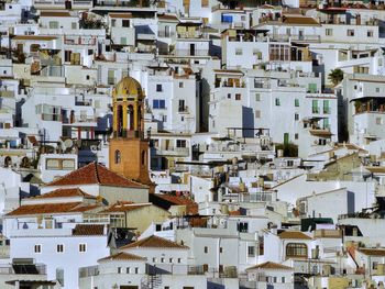 View of the houses and church of compete, a white village in spain