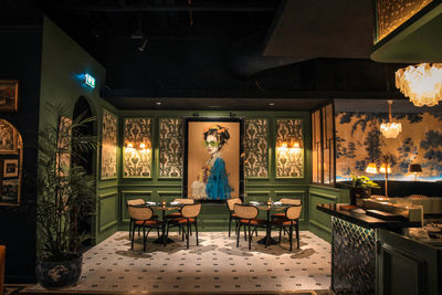 Rear view of woman in restaurant