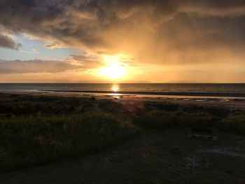 Scenic view of sea against sky during sunset