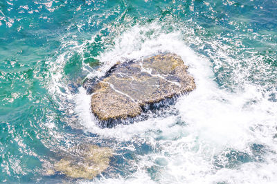 Waves splashing on shore