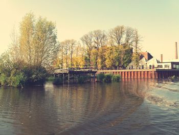 Scenic view of river against clear sky