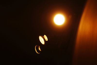 Close-up of illuminated lighting equipment