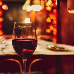 Close-up of wineglass on table