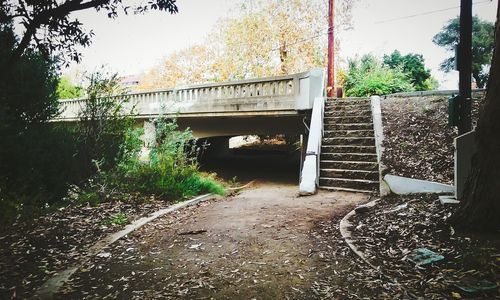 Empty built structure with trees in background