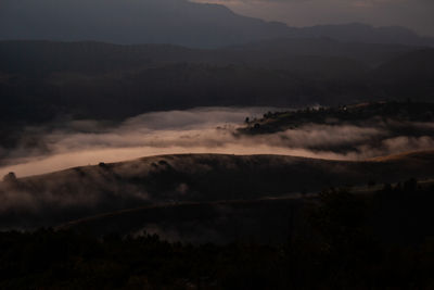 Scenic view of mountains against sky during sunset