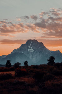 Scenic view of mountains against sky during sunset