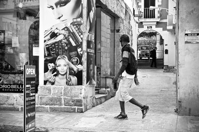 Man and woman walking in city