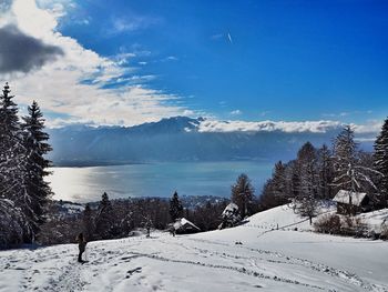 Scenic view of mountains against cloudy sky