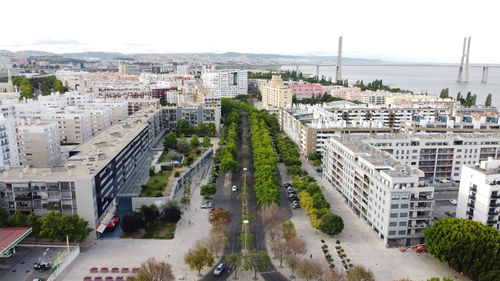 High angle view of street amidst buildings in city