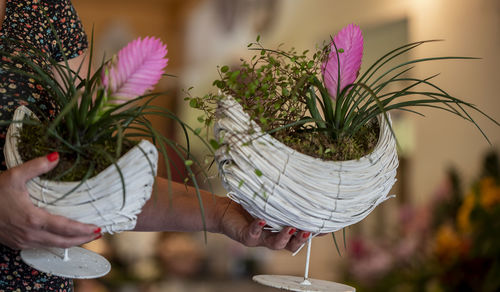 Close-up of hand holding bouquet