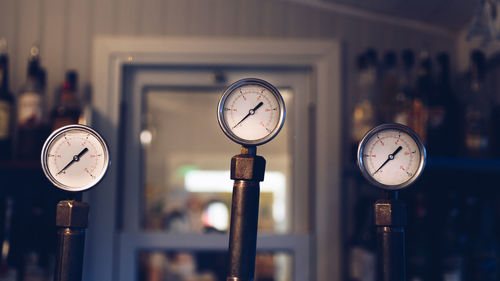 Close-up of pressure gauges in workshop