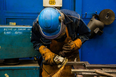 Man working on metal structure