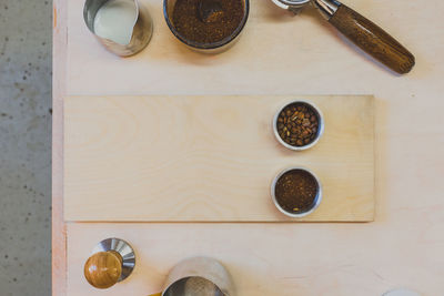 High angle view of coffee on cutting board