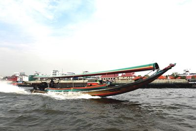 Boats sailing in sea