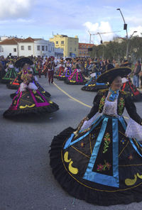 Panoramic view of people in city