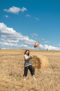 Full length of man on field against sky