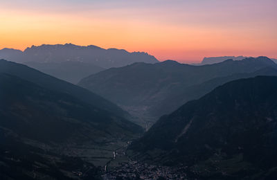 Scenic view of mountains against sky during sunset