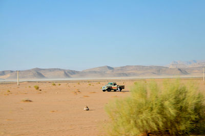 Scenic view of desert against clear sky