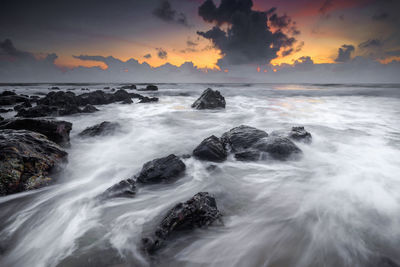 Scenic view of sea against sky during sunset