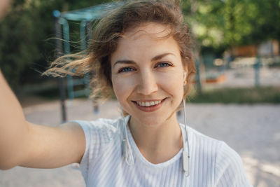 Portrait of smiling young woman