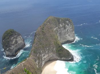 High angle view of rock formation in sea. holiyay in nusa penida, bali.