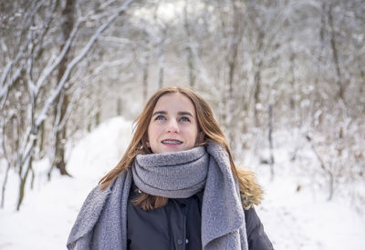 Portrait of a beautiful young woman in winter