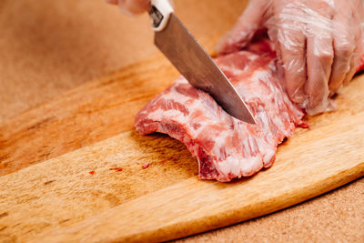 Close-up of meat on cutting board